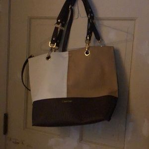 Calvin Klein brown and white reversible purse